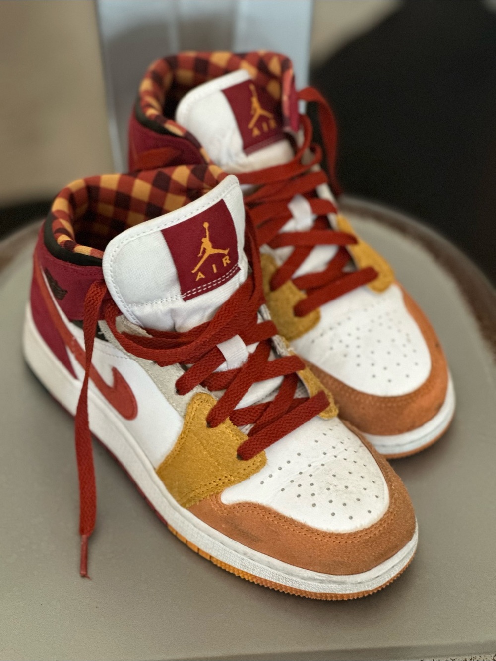 Jordan Kids Mid-Top Sneakers in White, Red, Orange, and Yellow